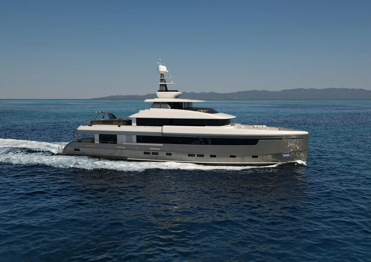 A sleek, modern yacht cruising through calm waters with a mountainous backdrop. aboard MAGNOLIA II Yacht for Sale