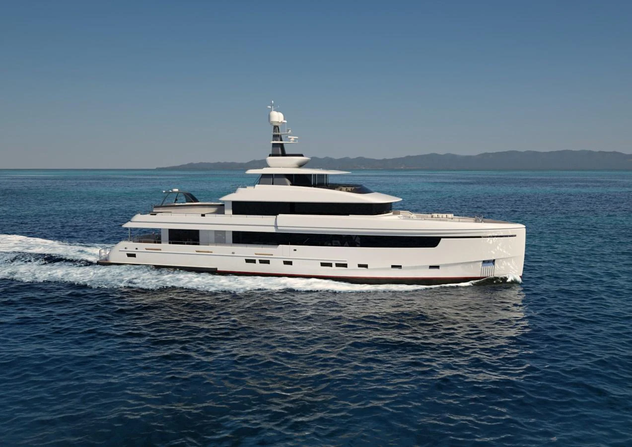 A sleek and modern yacht cruises through calm blue waters under a clear sky. aboard MAGNOLIA II Yacht for Sale