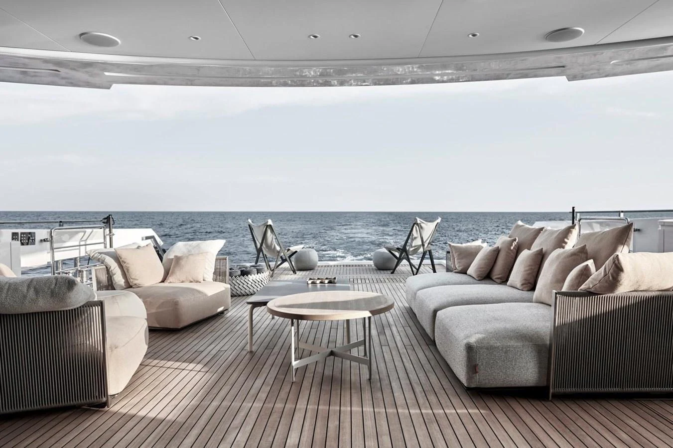 The aft deck features luxurious seating with a stunning ocean view. aboard ATTITUDE Yacht for Sale