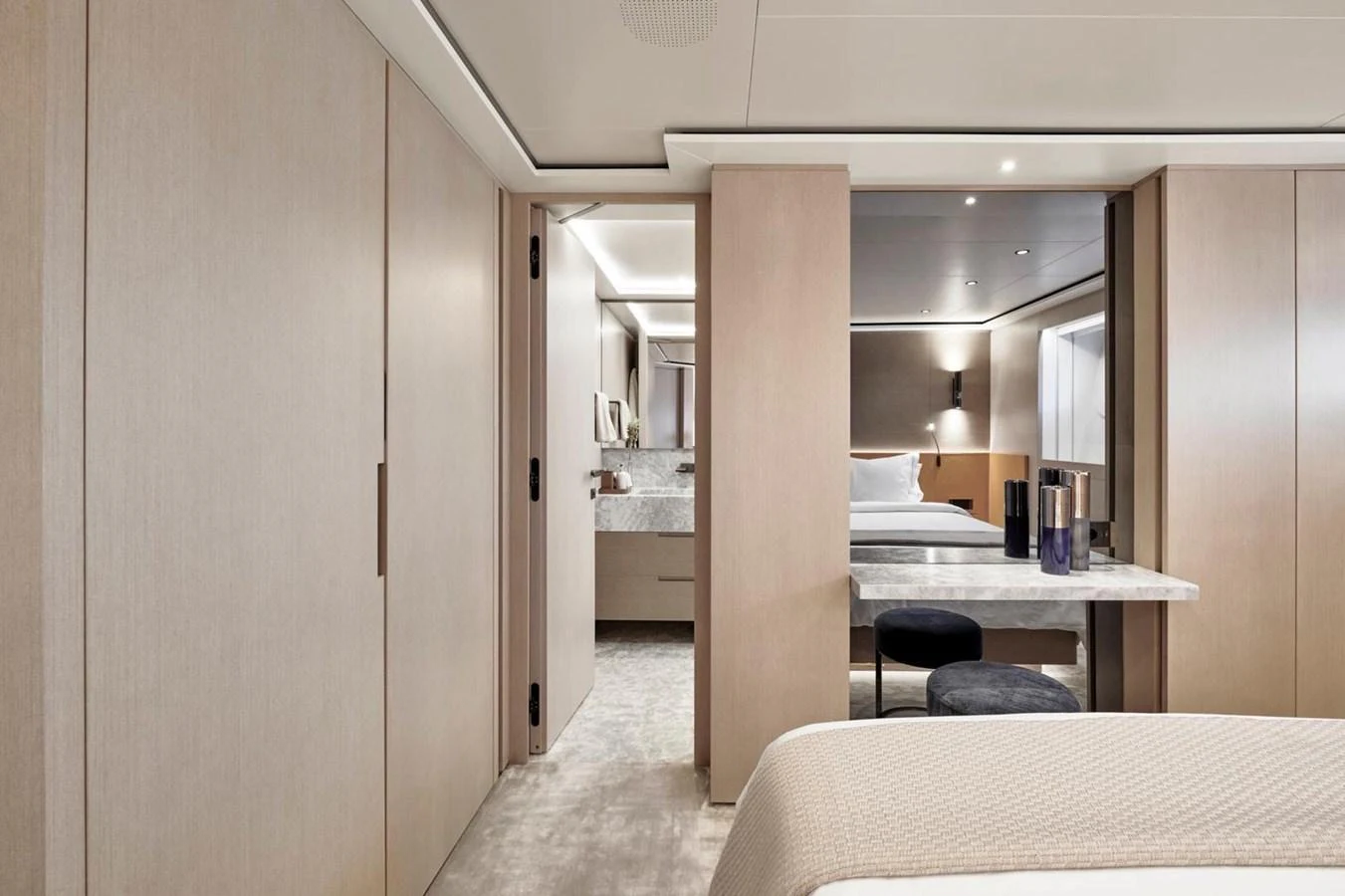 The image showcases a luxurious stateroom with modern design and elegant furnishings. aboard ATTITUDE Yacht for Sale