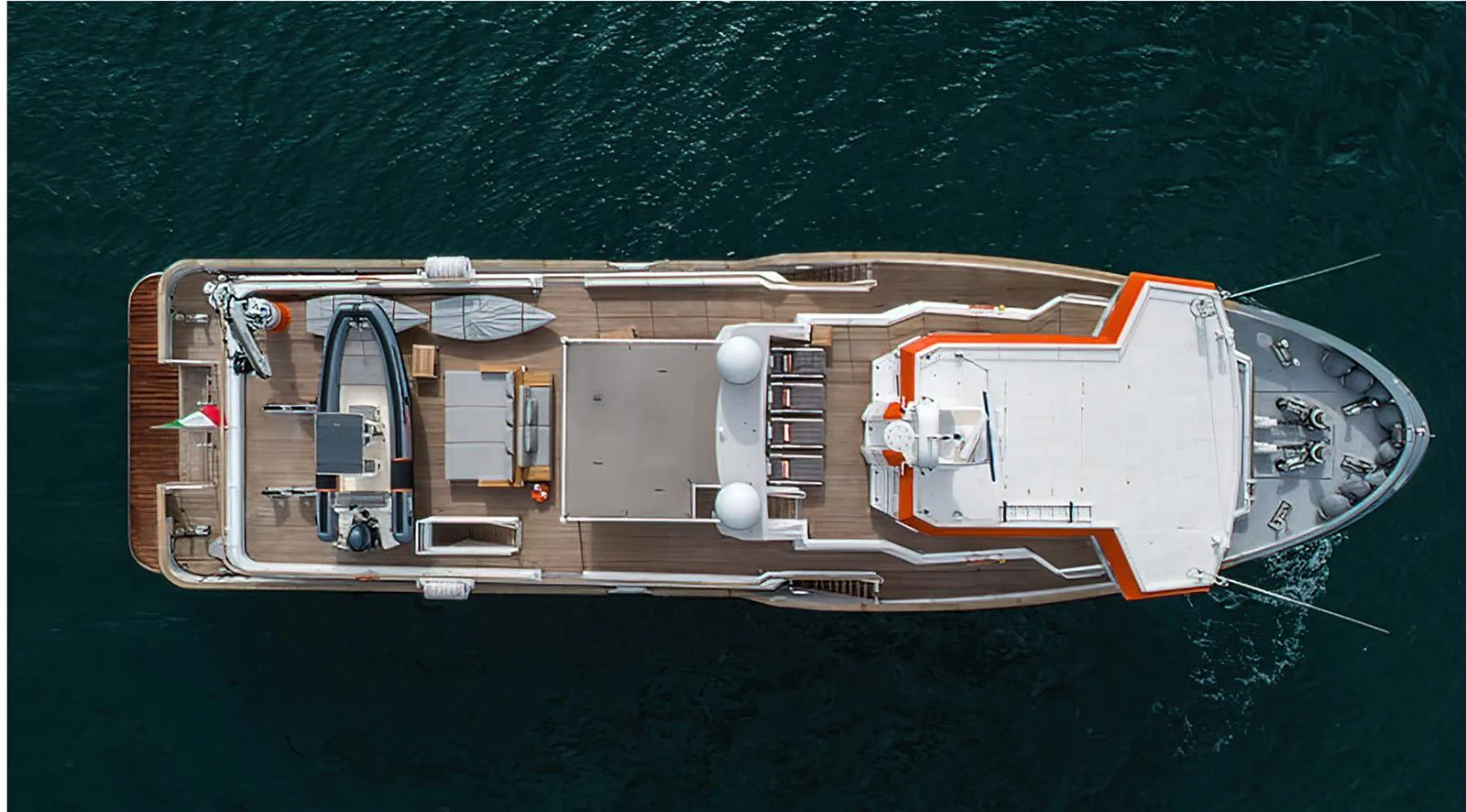 An aerial view of a yacht showcasing its deck layout and amenities. aboard EXPLORER 130 Yacht for Sale