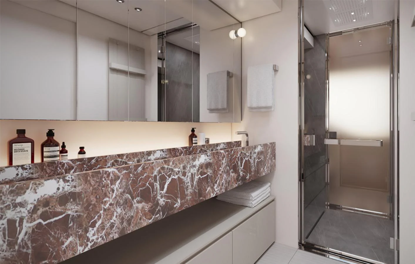 The yacht's bathroom features a luxurious marble countertop and modern fixtures. aboard DOGE 500 Yacht for Sale