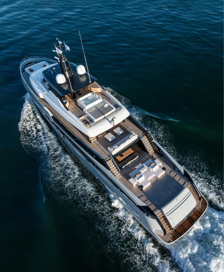 A sleek and modern yacht glides through the water, showcasing its luxurious deck and sophisticated design. aboard DOGE 500 Yacht for Sale