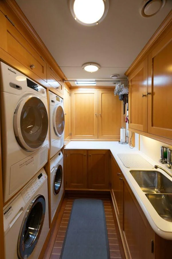 The yacht's laundry room is equipped with modern appliances and ample storage space. aboard CATALINA Yacht for Sale