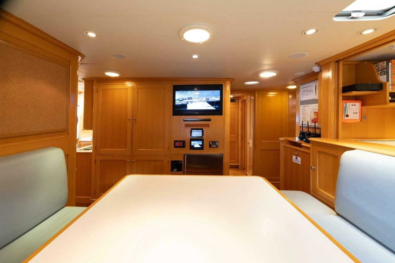 The yacht's dining area features comfortable seating and modern amenities. aboard CATALINA Yacht for Sale