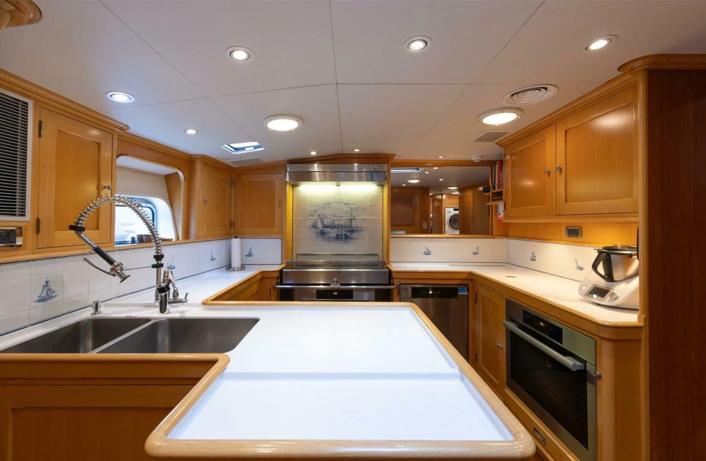 The yacht's galley features modern appliances and ample counter space, creating a functional and stylish cooking area. aboard CATALINA Yacht for Sale