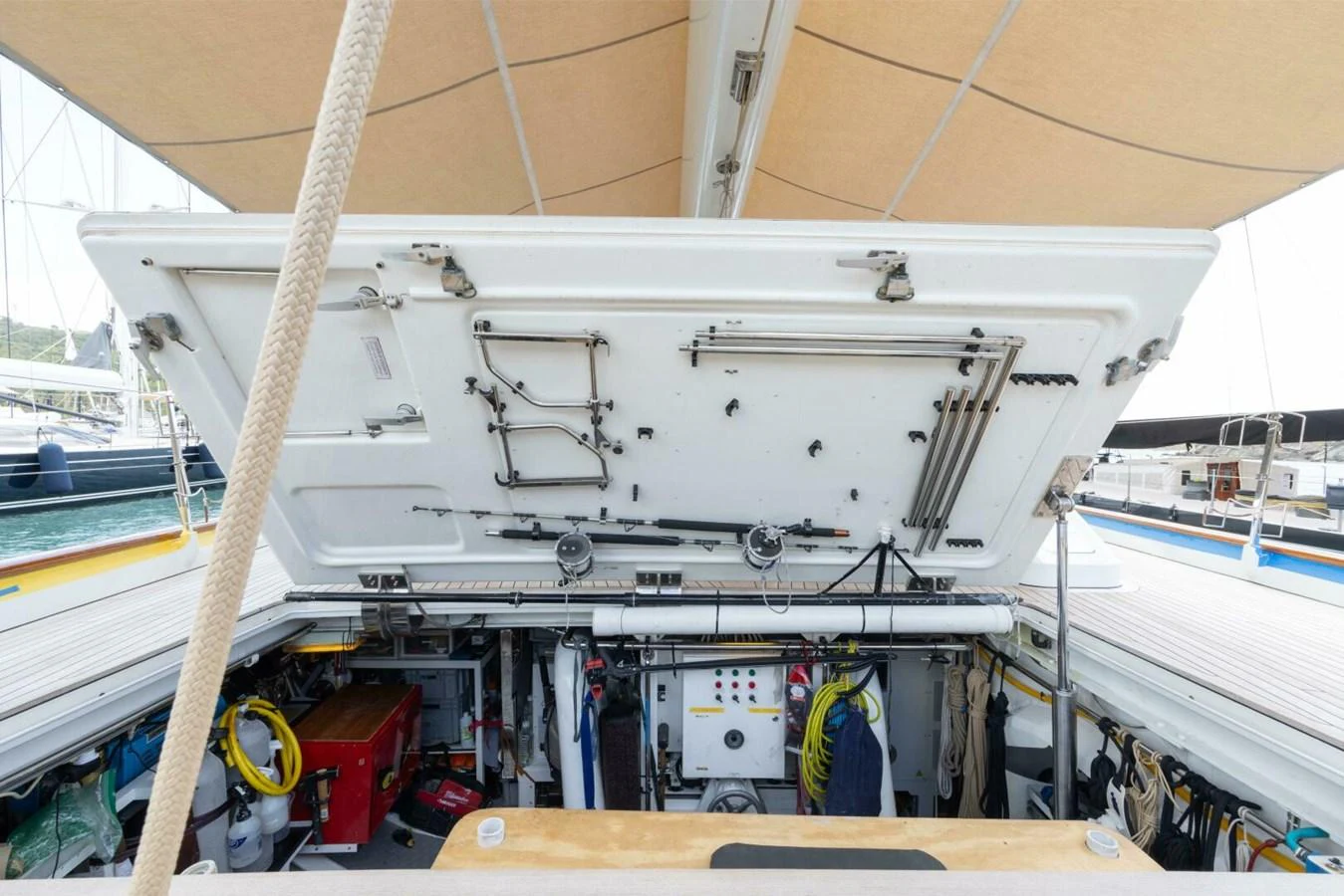 The image showcases the technical and storage area of the yacht, with various equipment and tools neatly organized. aboard CATALINA Yacht for Sale