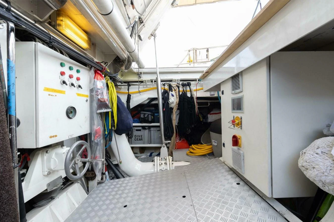 The image showcases the well-organized engine room of the yacht, featuring various control panels and equipment. aboard CATALINA Yacht for Sale
