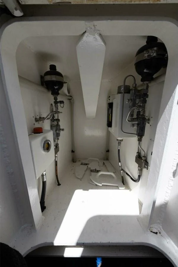 A view of the yacht's engine room showcasing its mechanical components. aboard CATALINA Yacht for Sale
