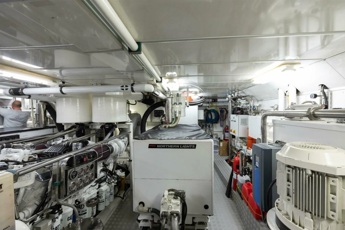 The image showcases the well-maintained engine room of the yacht, featuring advanced machinery and equipment. aboard CATALINA Yacht for Sale
