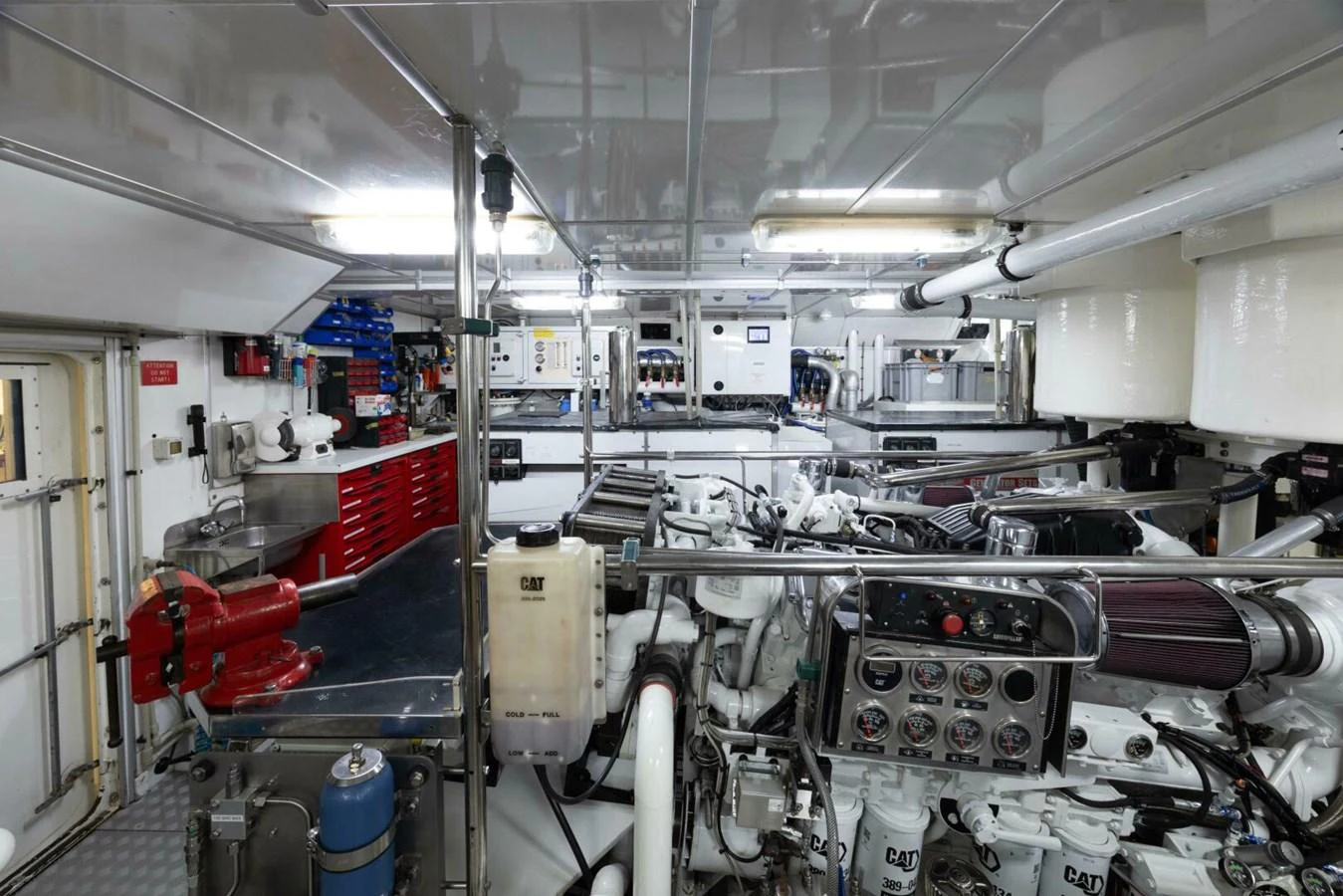The image showcases the well-organized and high-tech engine room of the yacht. aboard CATALINA Yacht for Sale