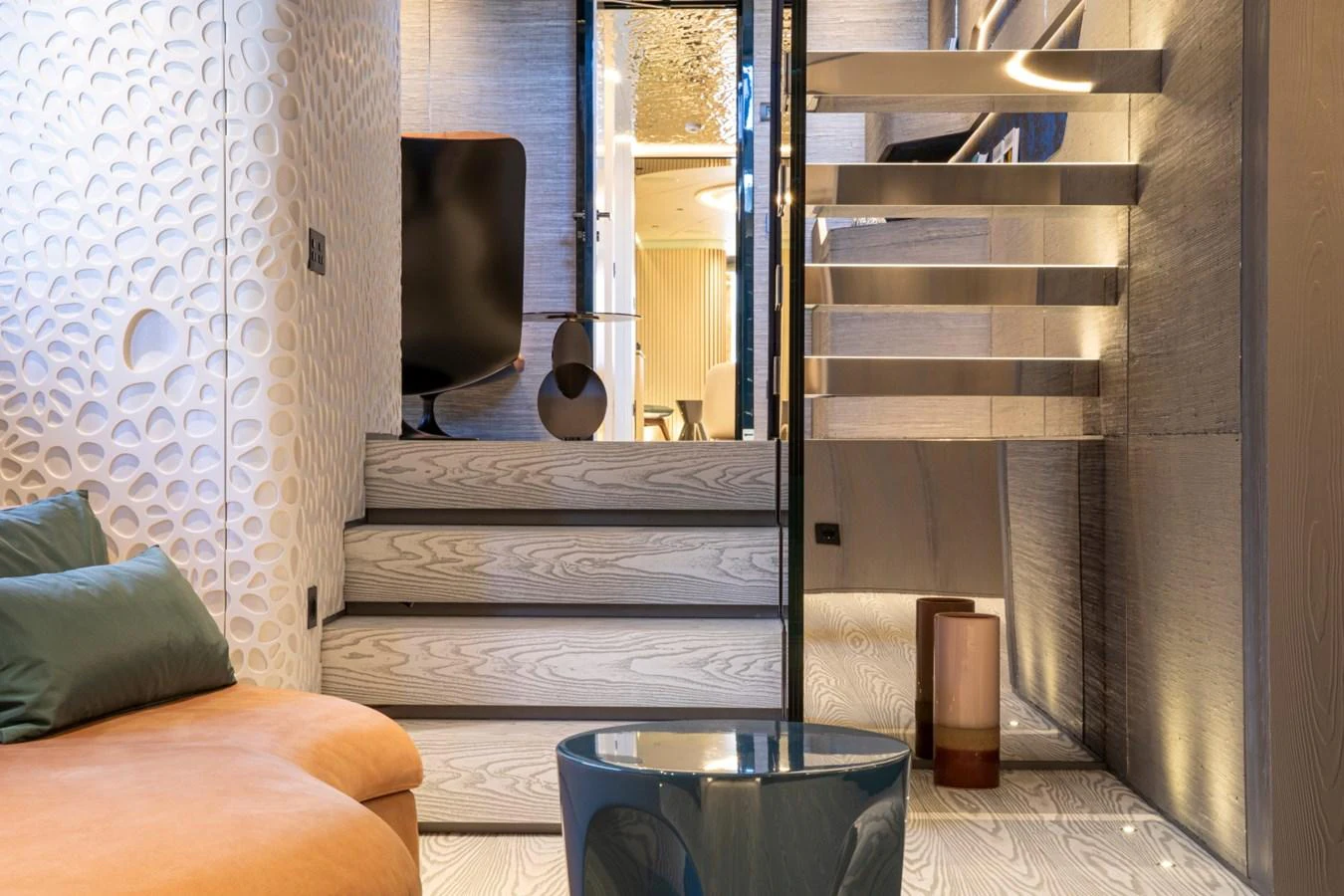The yacht's interior showcases a modern and stylish design with a blend of textures and materials. aboard PACIFIC PEARL Yacht for Sale