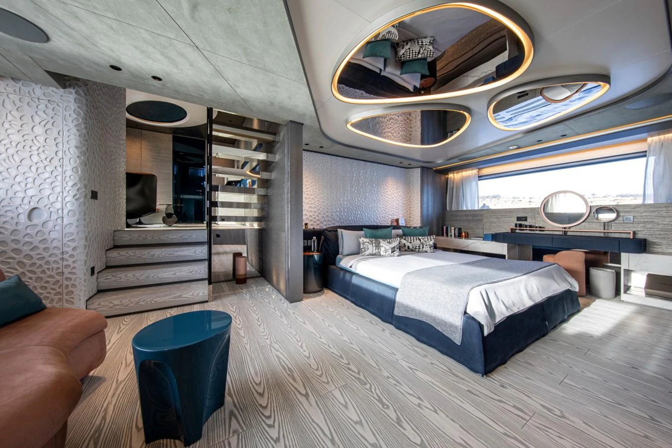 The master stateroom features modern design elements with luxurious furnishings and ample natural light. aboard PACIFIC PEARL Yacht for Sale