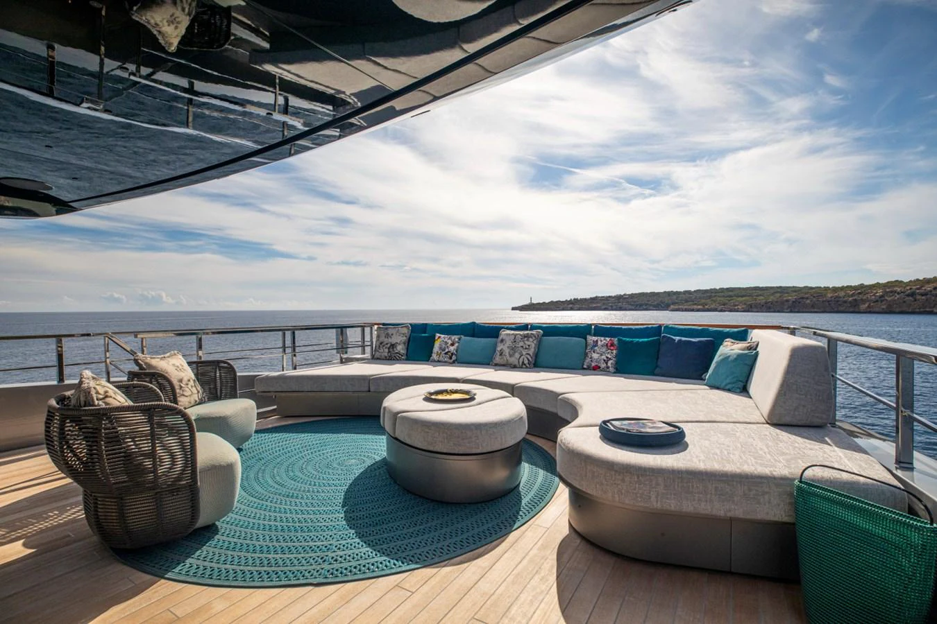 The aft deck features a spacious and stylish seating area with a panoramic ocean view. aboard PACIFIC PEARL Yacht for Sale