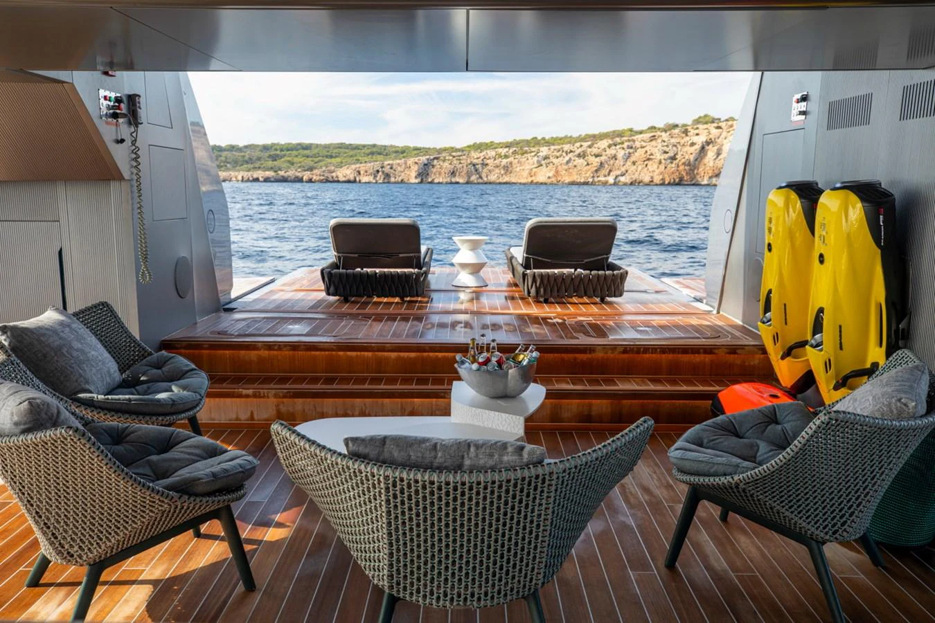 The aft deck offers a luxurious lounging area with comfortable seating and stunning views of the sea. aboard PACIFIC PEARL Yacht for Sale