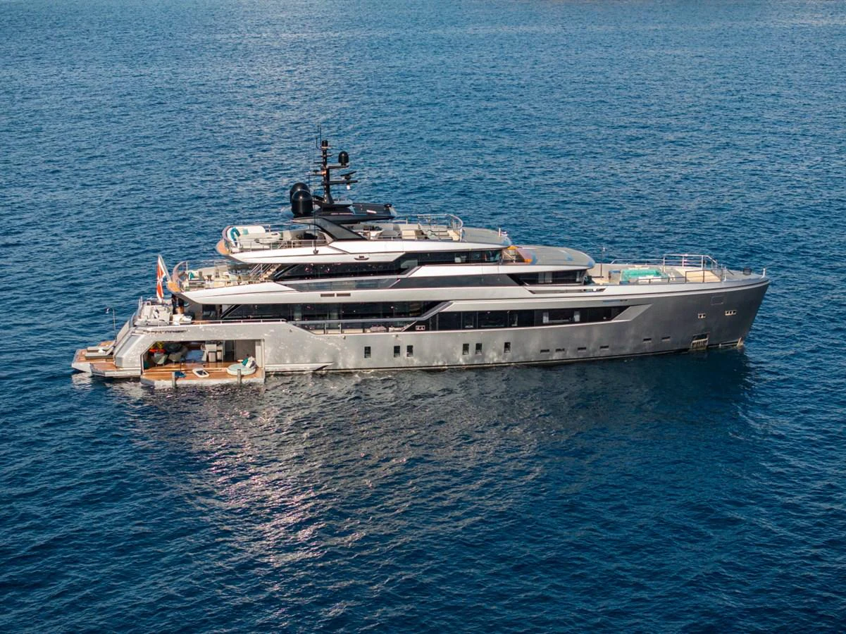 A sleek and modern yacht cruising on calm blue waters. aboard PACIFIC PEARL Yacht for Sale
