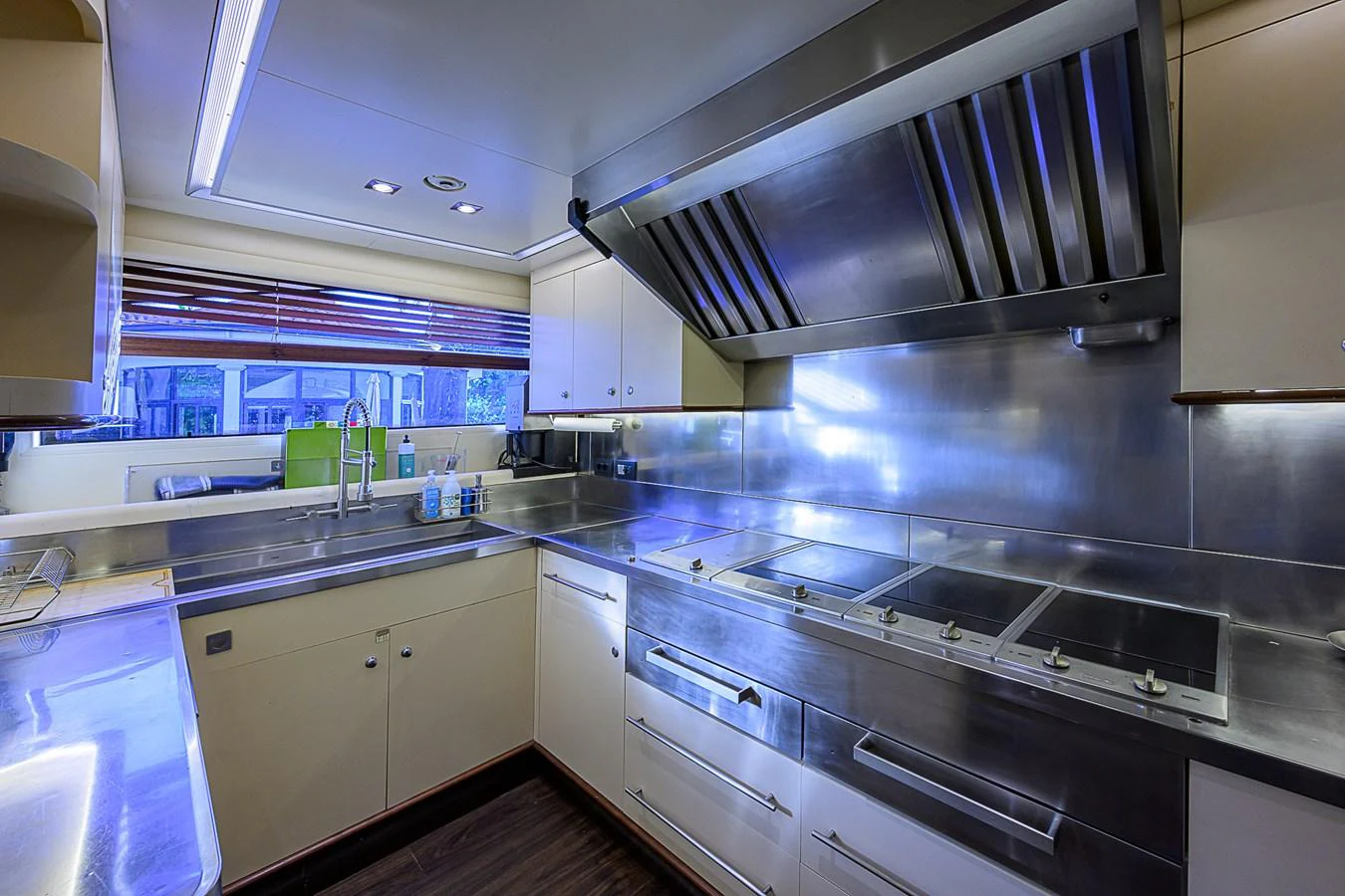 The yacht's galley is equipped with modern stainless steel appliances and ample counter space. aboard SEASCAPE V Yacht for Sale
