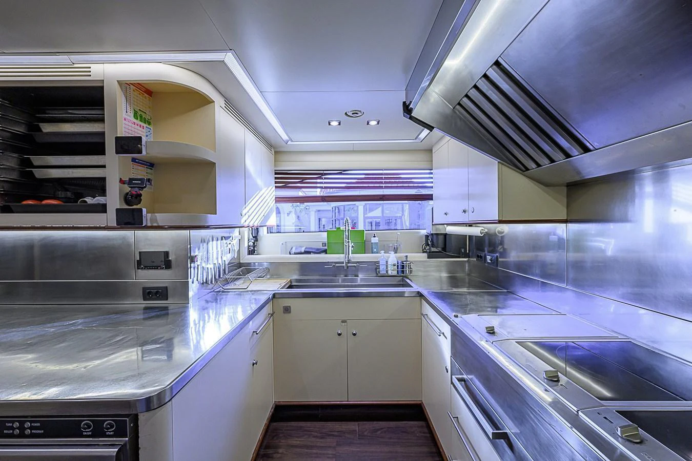 The yacht's galley features modern stainless steel appliances and ample counter space for gourmet meal preparation. aboard SEASCAPE V Yacht for Sale