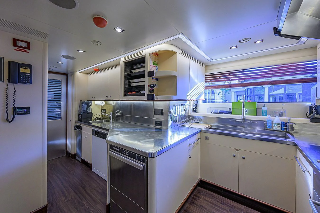 The galley features modern appliances and ample counter space, perfect for gourmet meal preparation. aboard SEASCAPE V Yacht for Sale