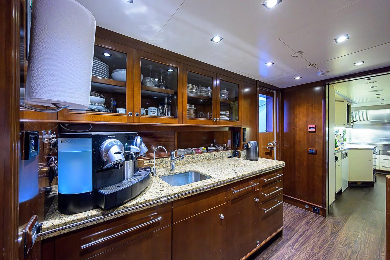 The yacht's galley features modern appliances and ample storage, creating a functional and stylish space for meal preparation. aboard SEASCAPE V Yacht for Sale