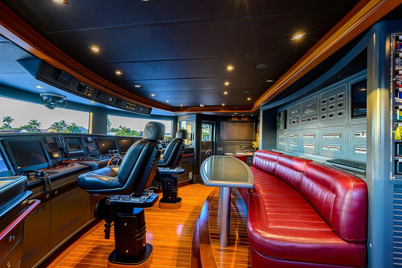 The helm features state-of-the-art navigation equipment and luxurious seating for optimal comfort. aboard SEASCAPE V Yacht for Sale