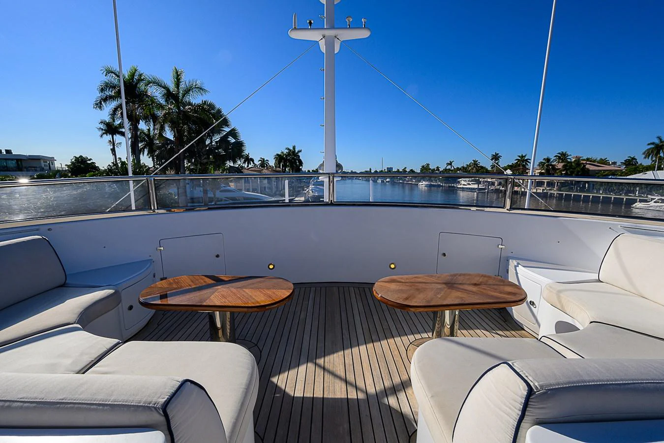 The aft deck offers a spacious and inviting area for relaxation with comfortable seating and scenic views. aboard SEASCAPE V Yacht for Sale