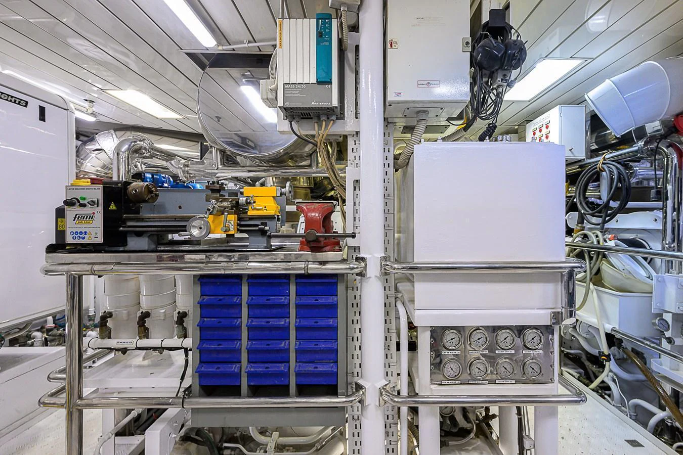 The image showcases the well-organized and high-tech engine room of the yacht. aboard SEASCAPE V Yacht for Sale