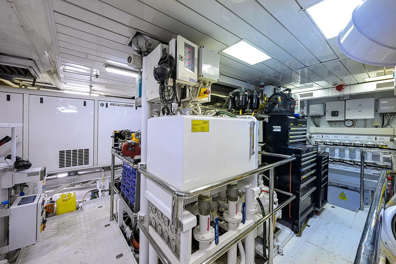 The image showcases the well-organized and high-tech engine room of the yacht. aboard SEASCAPE V Yacht for Sale