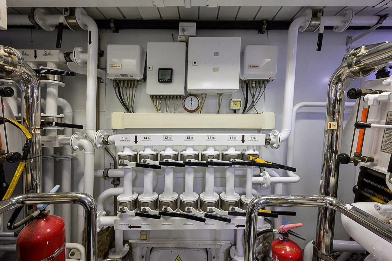 The image showcases the technical and mechanical components of the yacht's engine room. aboard SEASCAPE V Yacht for Sale