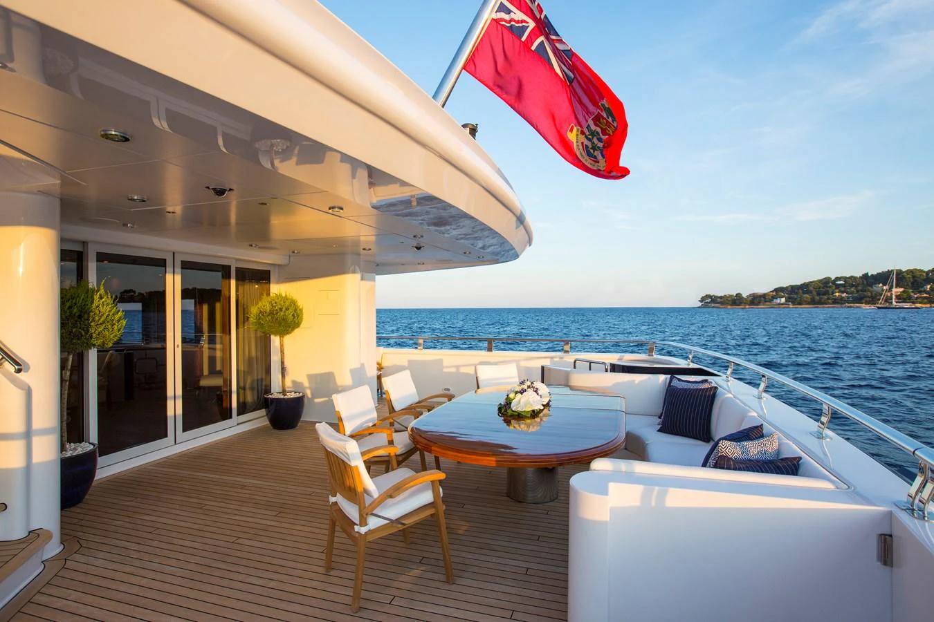 The aft deck offers a spacious and inviting area for relaxation and dining with stunning ocean views. aboard ALASKA OF GEORGE TOWN Yacht for Sale