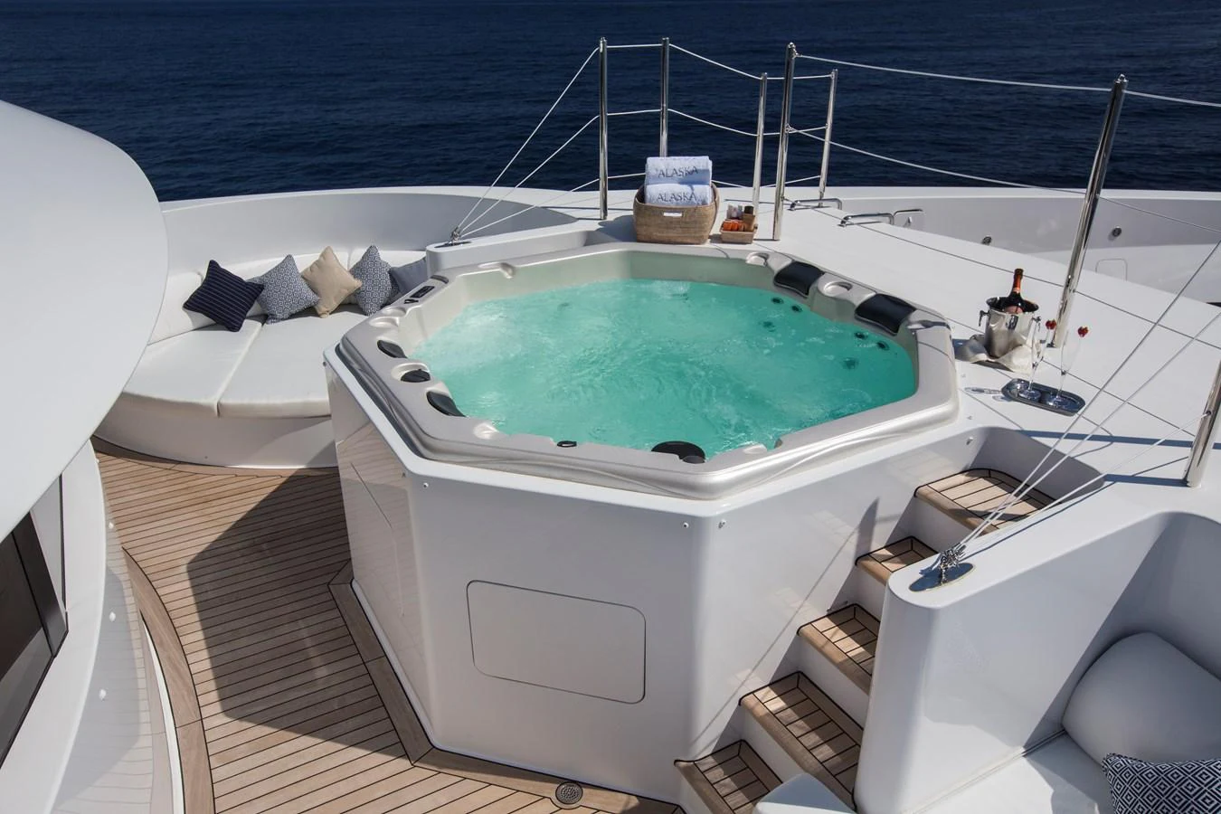 The sundeck features a luxurious hot tub with ample seating and stunning ocean views. aboard ALASKA OF GEORGE TOWN Yacht for Sale
