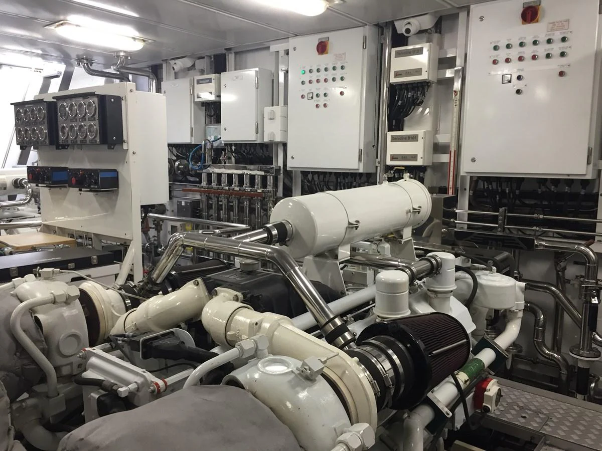 The image showcases the well-organized and high-tech engine room of the yacht. aboard ALASKA OF GEORGE TOWN Yacht for Sale