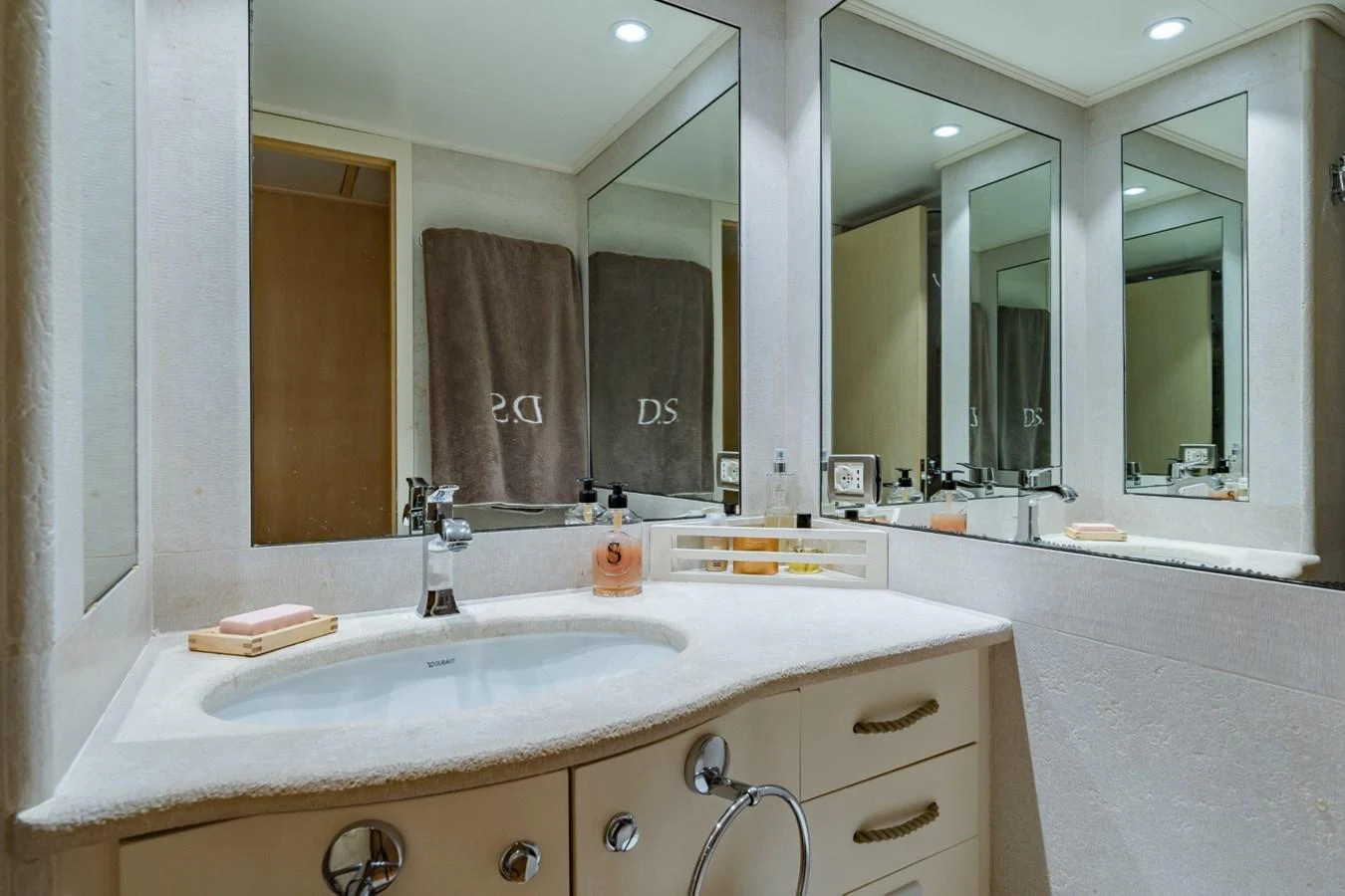 A well-appointed yacht bathroom with modern fixtures and ample lighting. aboard DIONE STAR Yacht for Sale