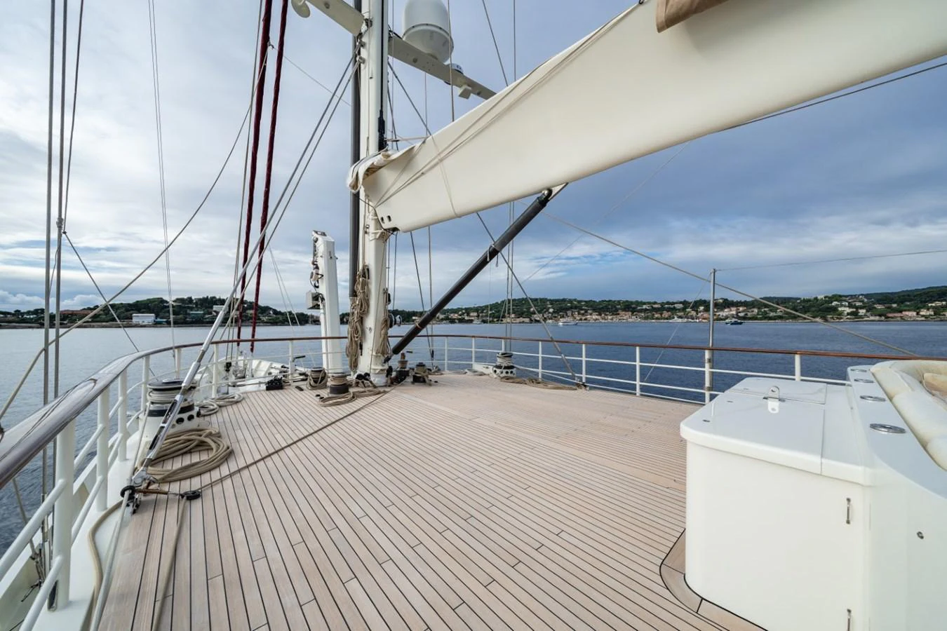 The spacious deck offers a serene view of the surrounding waters and coastline. aboard DIONE STAR Yacht for Sale