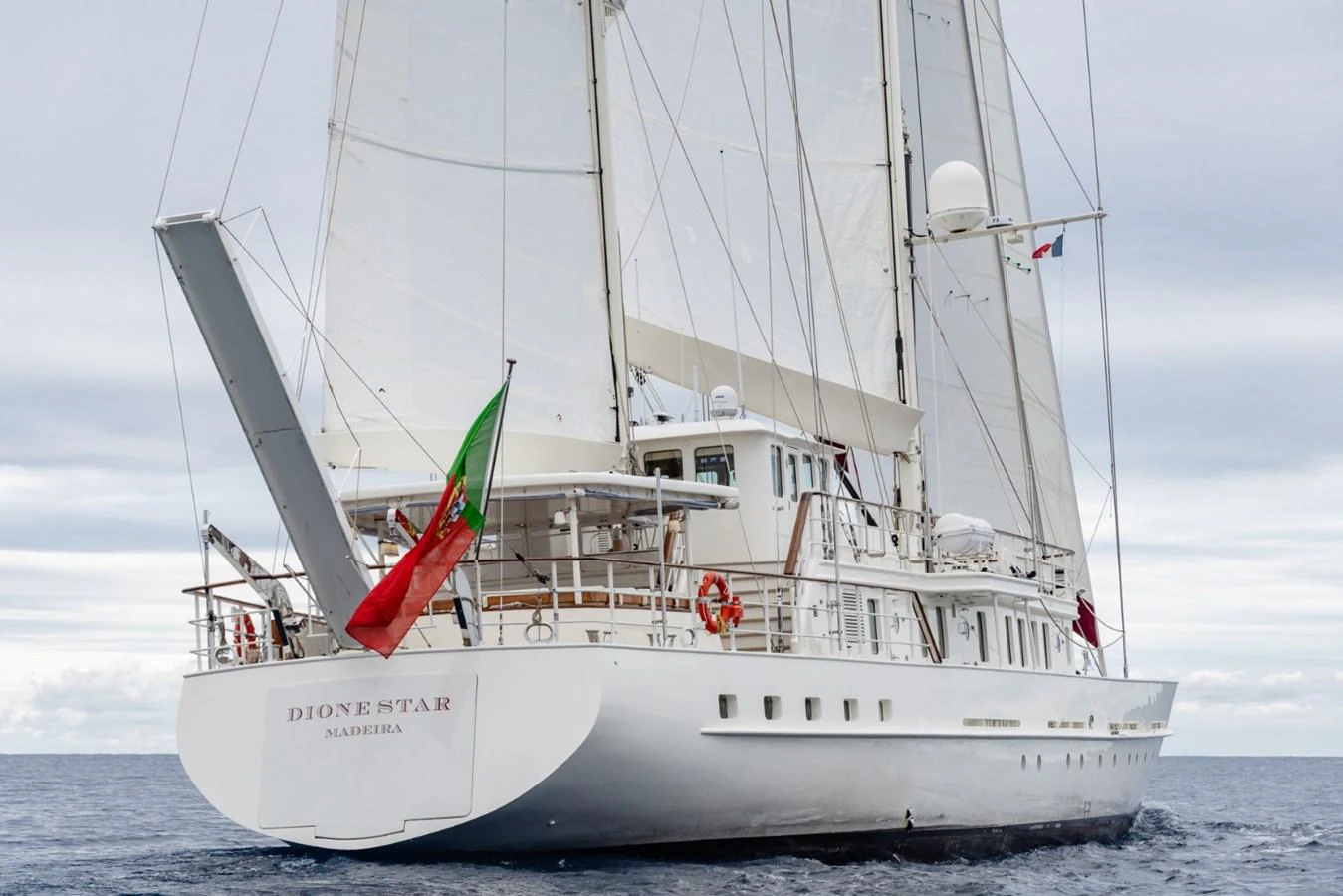 A majestic sailing yacht glides gracefully on the open sea, showcasing its elegant design and impressive sails. aboard DIONE STAR Yacht for Sale