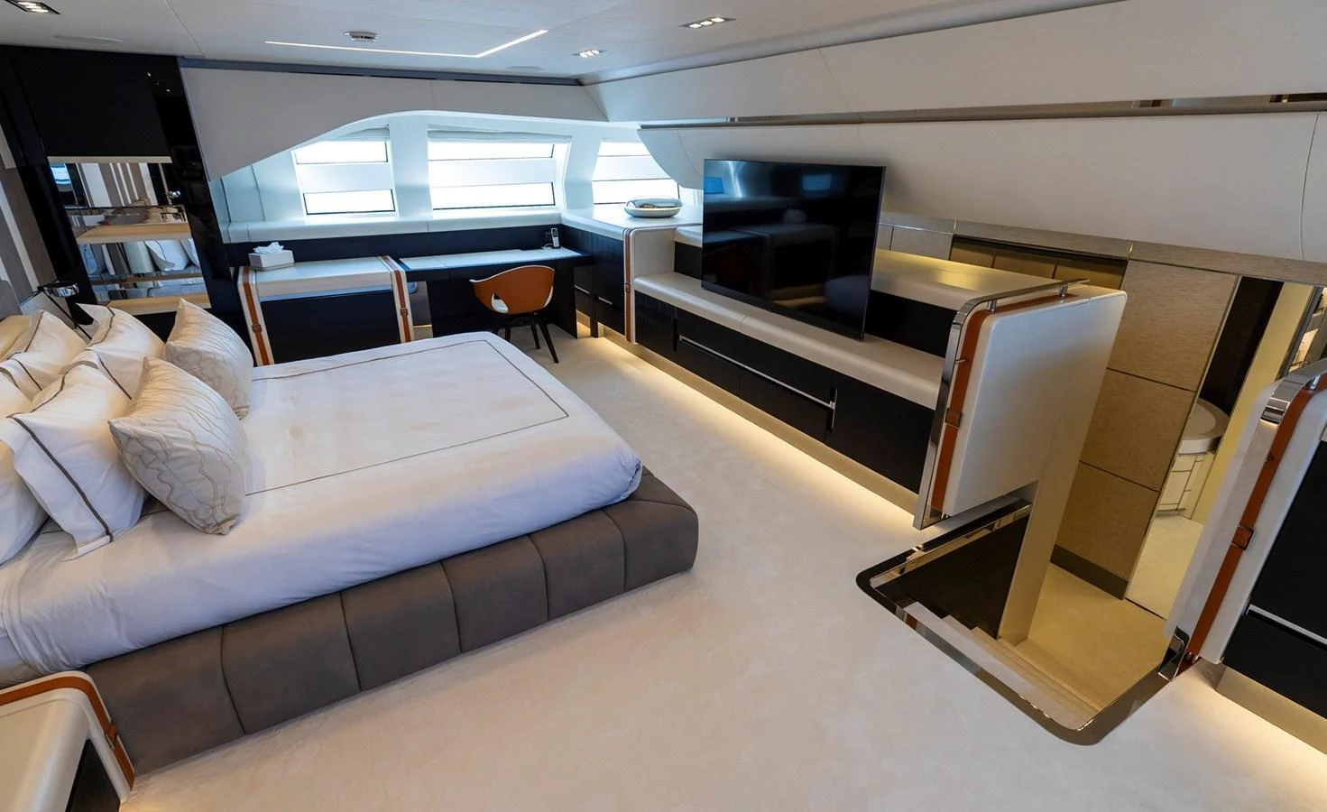 The master stateroom features a luxurious bed, ample storage, and modern amenities for ultimate comfort. aboard PERSHING 140 Yacht for Sale