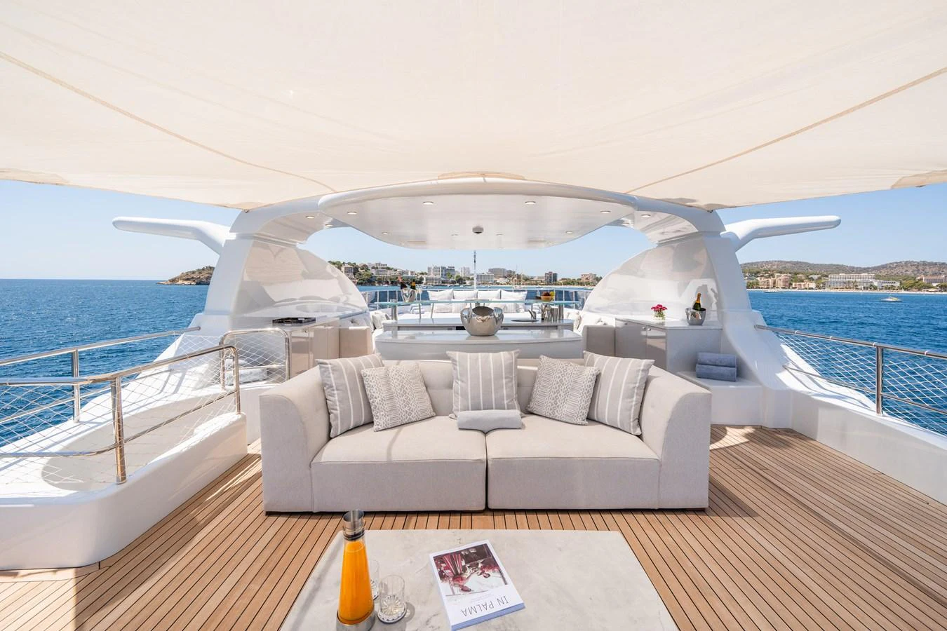 The sundeck offers a luxurious lounging area with comfortable seating and stunning sea views. aboard TITIAN PEARL Yacht for Sale