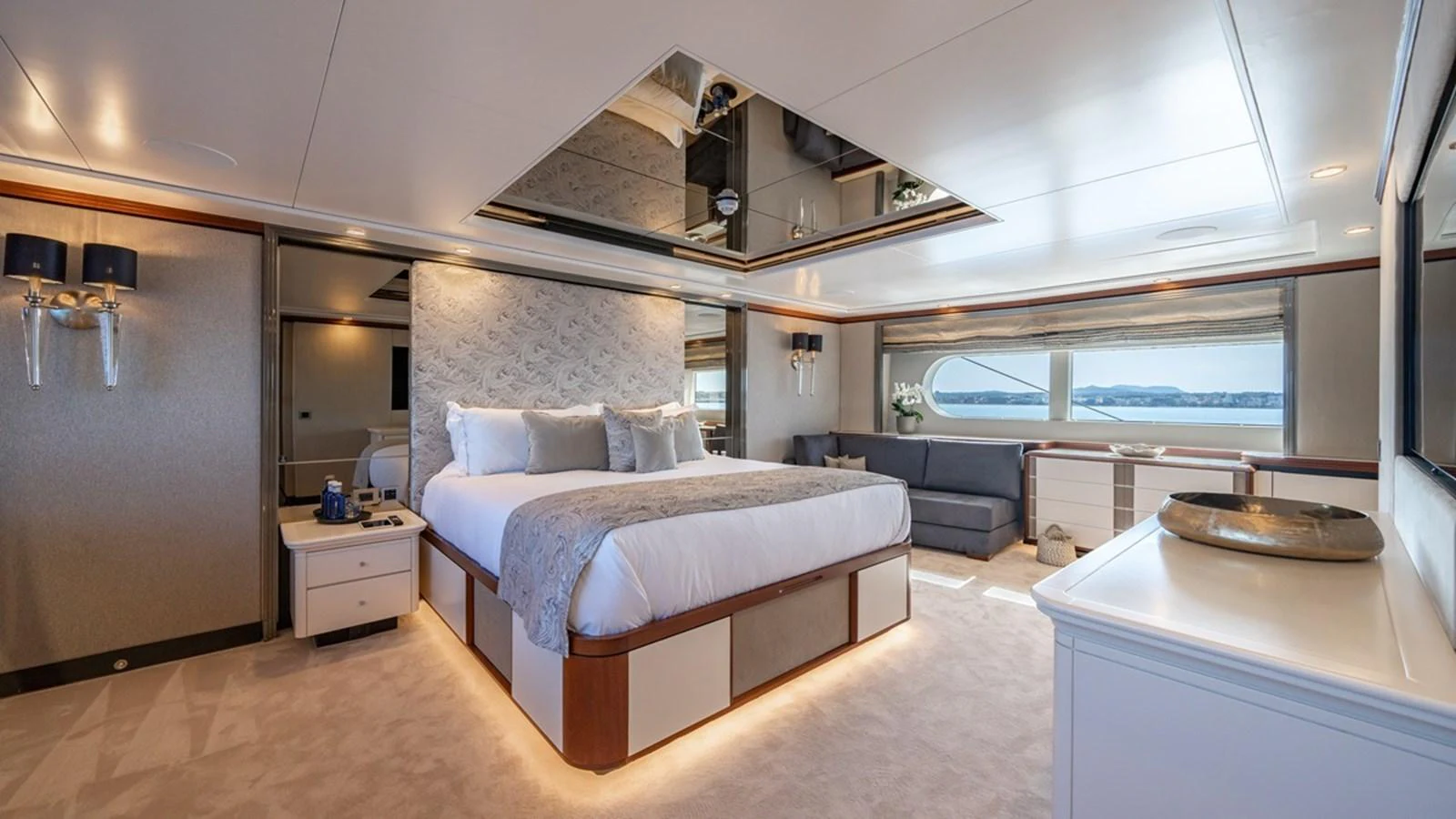 The master stateroom offers a luxurious and spacious retreat with elegant furnishings and panoramic views. aboard TITIAN PEARL Yacht for Sale