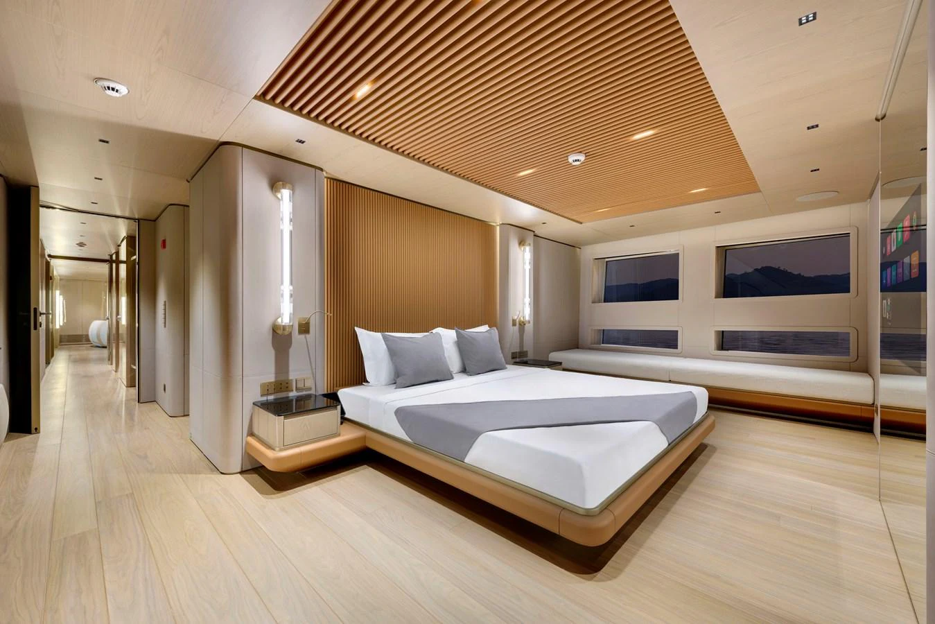 The master stateroom features a spacious layout with modern design elements and large windows offering scenic views. aboard XIMENA Yacht for Sale