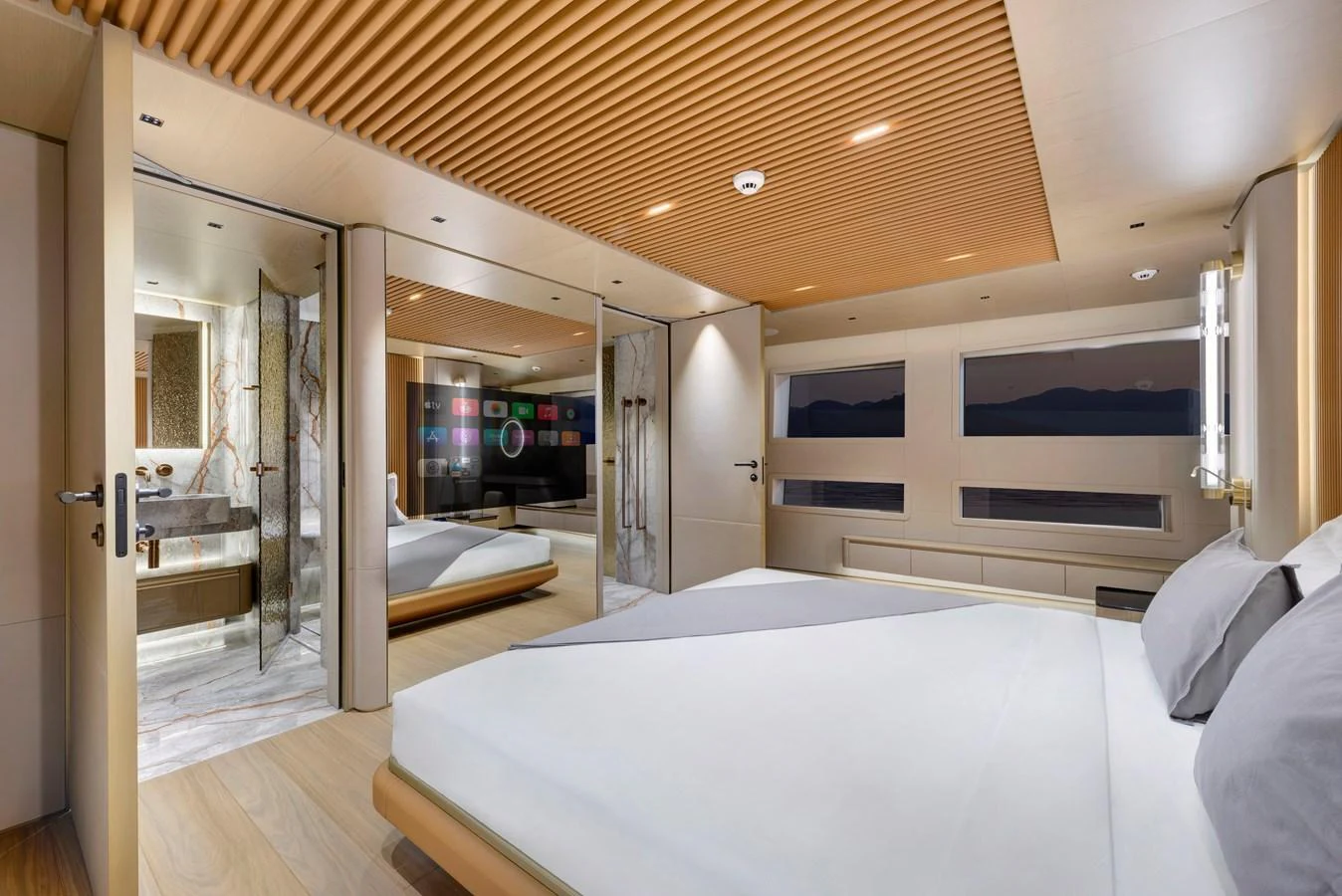 The master stateroom features a spacious layout with modern design elements and luxurious amenities. aboard XIMENA Yacht for Sale