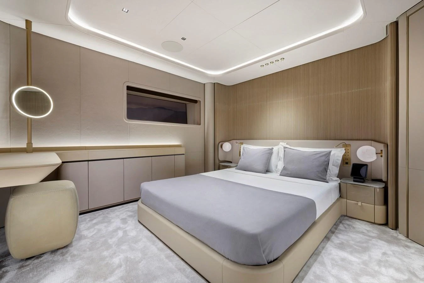 A luxurious stateroom featuring a large bed, modern furnishings, and ambient lighting. aboard XIMENA Yacht for Sale