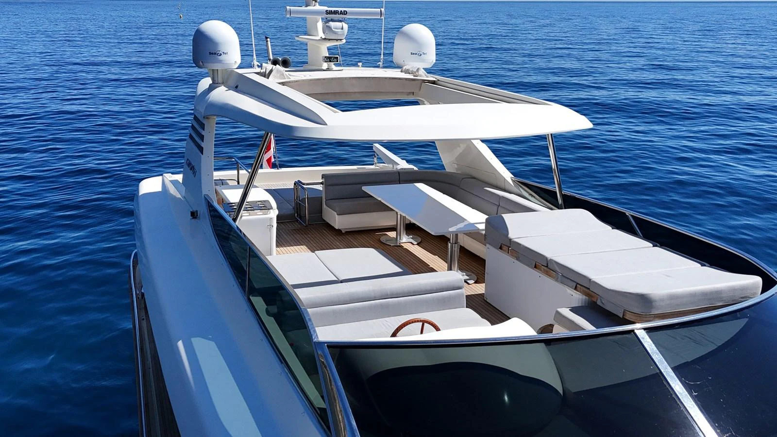 The yacht's flybridge offers a luxurious space for relaxation and socializing with ample seating and sunbathing areas. aboard TIME OUT TOGETHER Yacht for Sale