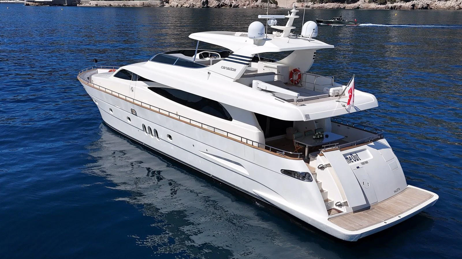 A sleek and modern yacht cruising on calm blue waters, showcasing its elegant design and spacious decks. aboard TIME OUT TOGETHER Yacht for Sale