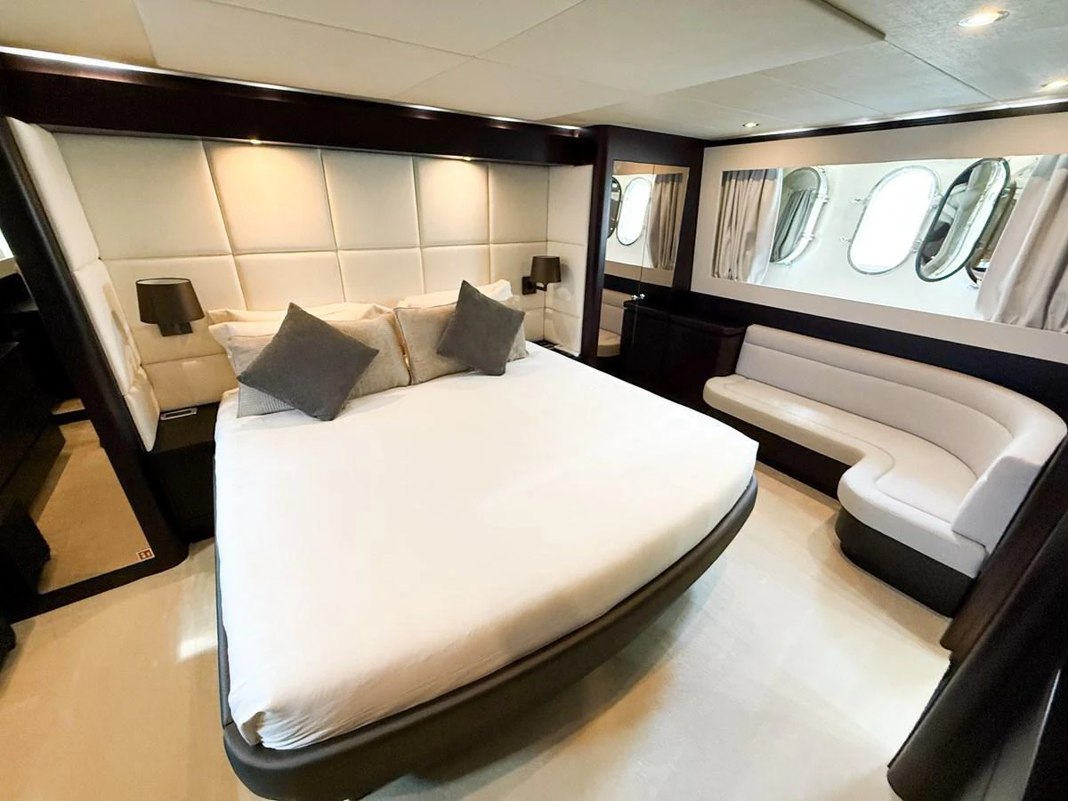 The master stateroom offers a luxurious and spacious retreat with elegant furnishings and ample natural light. aboard TIME OUT TOGETHER Yacht for Sale