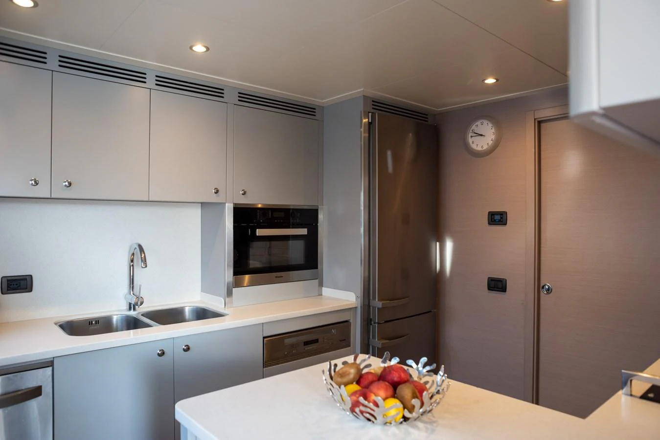 The galley features modern appliances and a sleek design, perfect for gourmet cooking at sea. aboard GRANIL Yacht for Sale