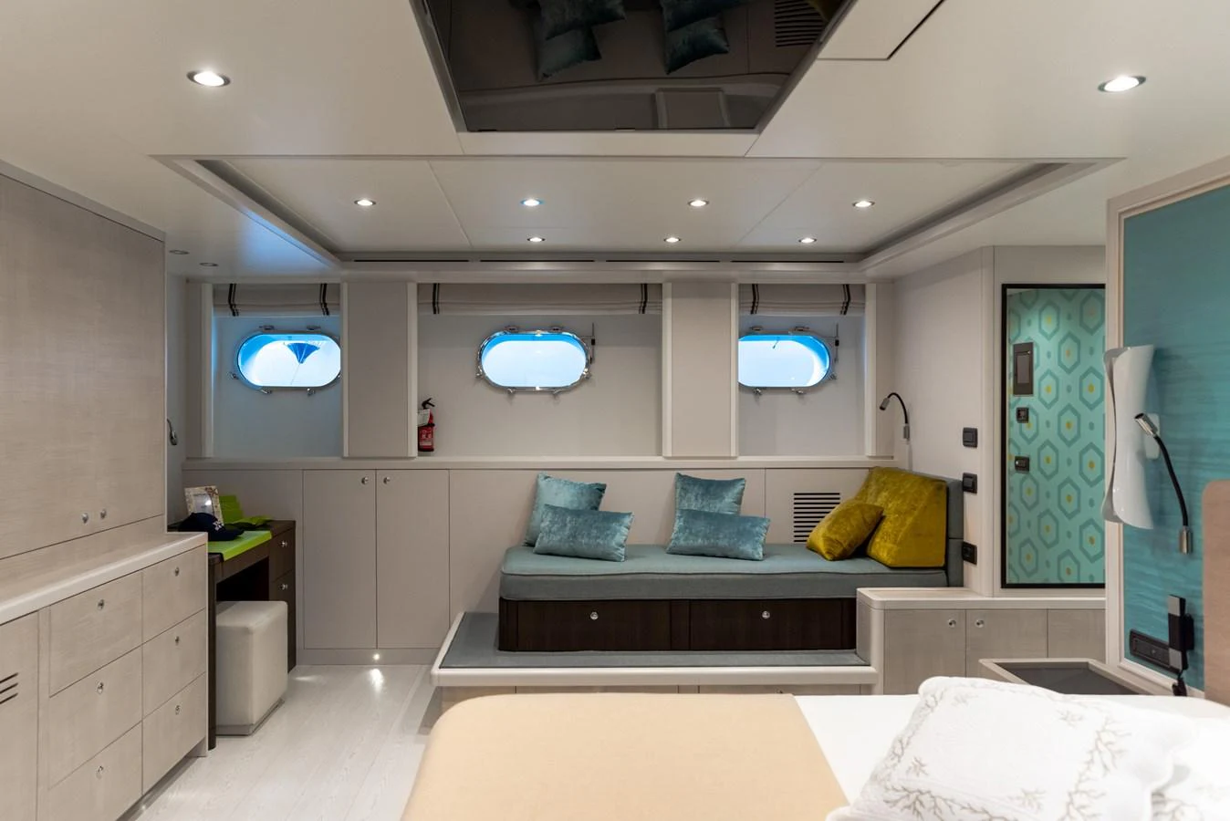 A spacious and elegantly designed stateroom with modern furnishings and ample natural light. aboard GRANIL Yacht for Sale