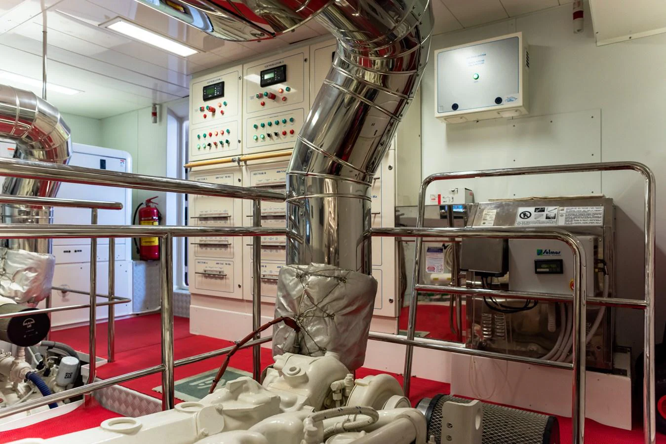 The engine room showcases advanced machinery and control panels, highlighting the yacht's technical sophistication. aboard GRANIL Yacht for Sale