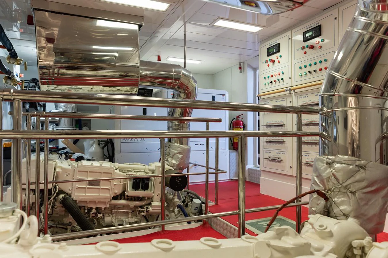 The engine room showcases advanced machinery and control panels, highlighting the yacht's technical sophistication. aboard GRANIL Yacht for Sale