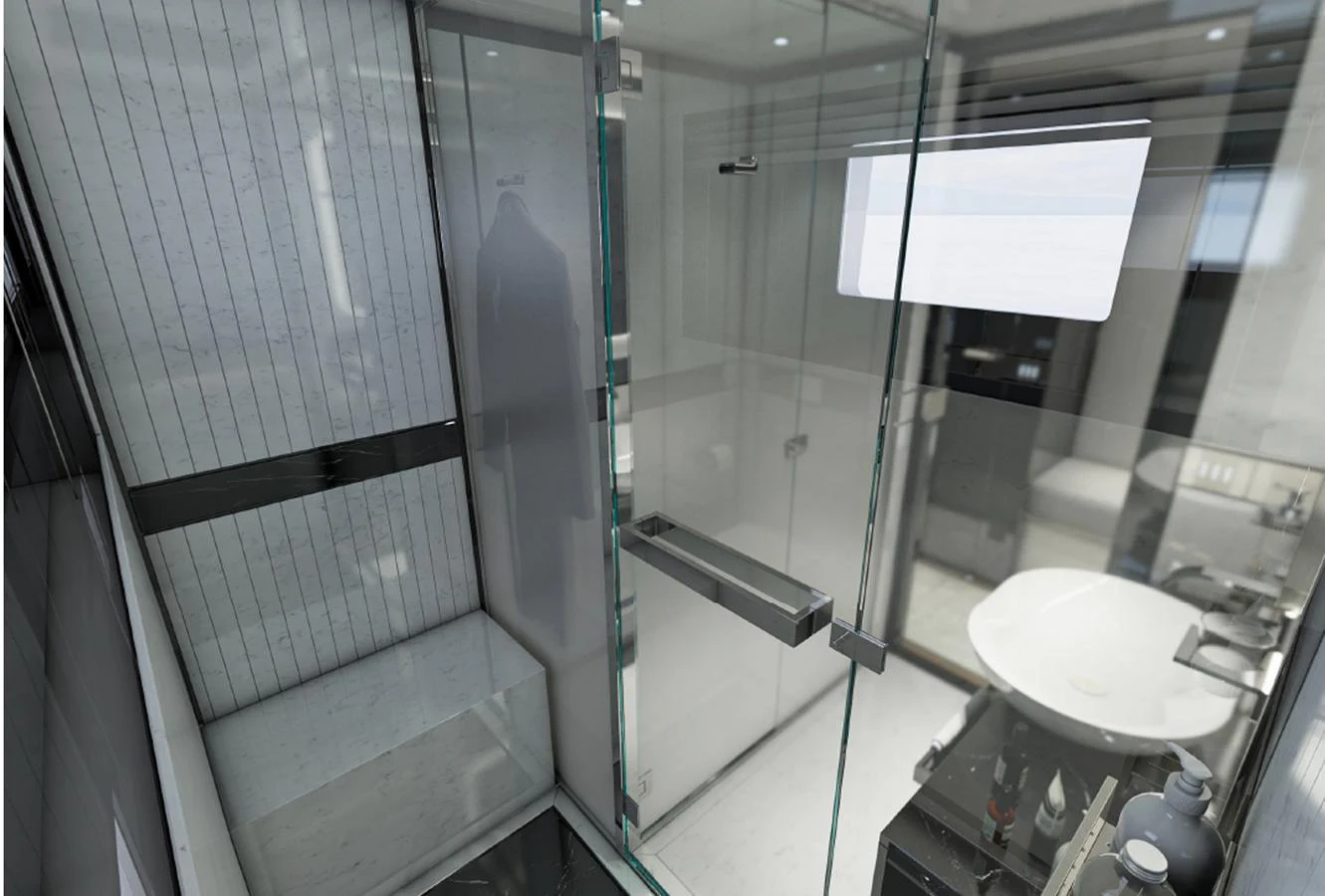 A sleek and modern bathroom with a glass-enclosed shower and contemporary fixtures. aboard AES Yacht for Sale