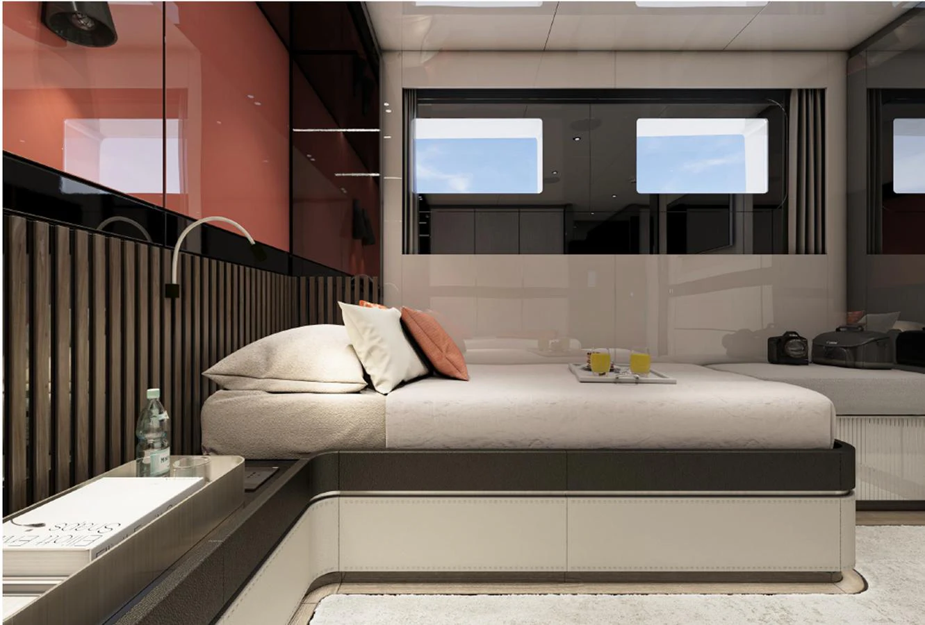 A luxurious stateroom featuring a comfortable bed and modern decor. aboard AES Yacht for Sale